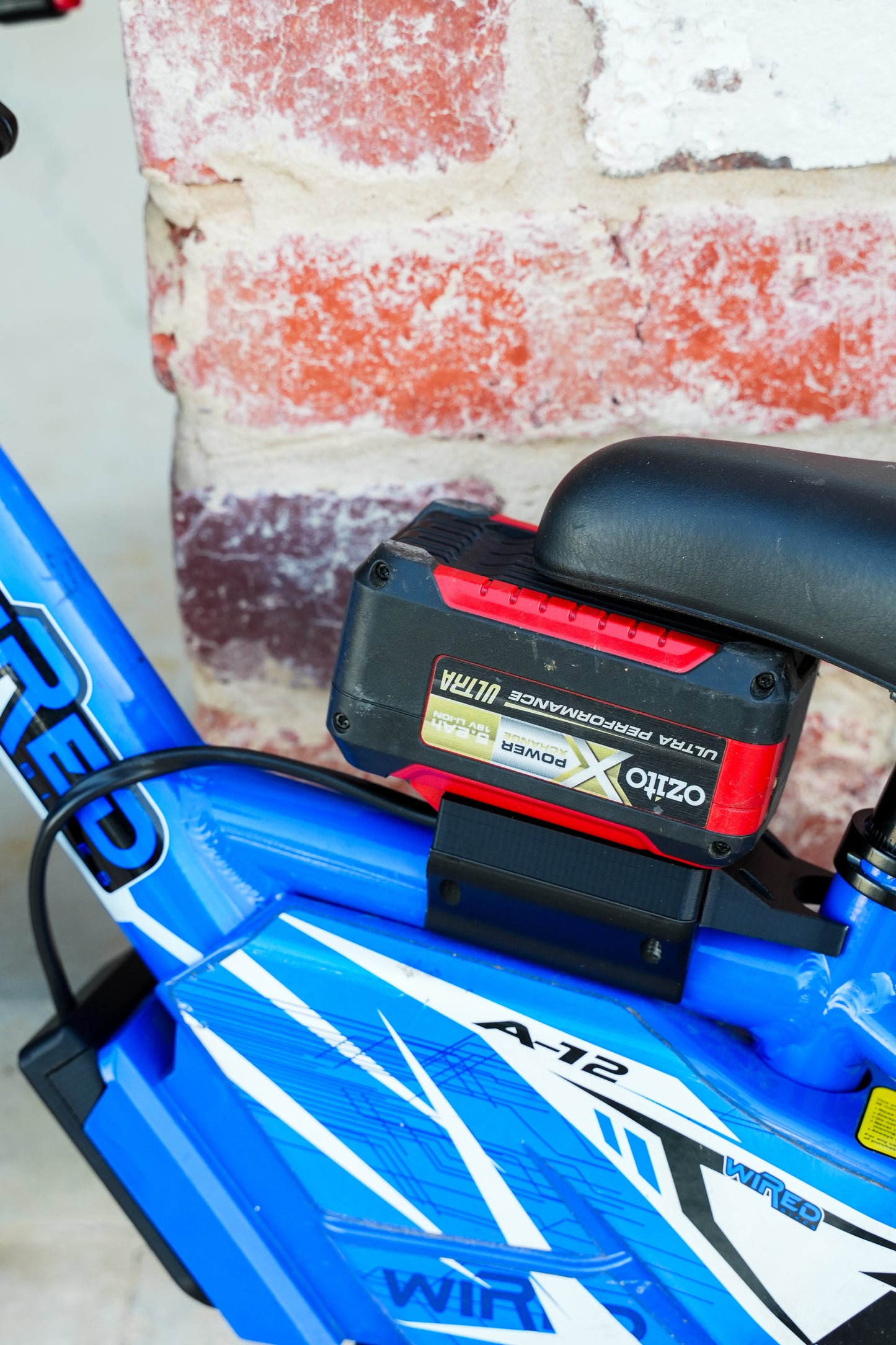 Ozito 18v Wired Bike battery adaptor to suit 12" Models